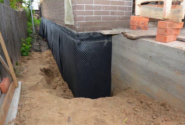 SJ Waterproofing Pros technician performing targeted Foundation Crack Repair assessment in Vernon Hills, IL